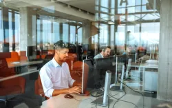 Service desk workers at workstations