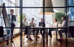 Consultants brainstorming in a meeting room
