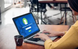 woman using chatbot on laptop