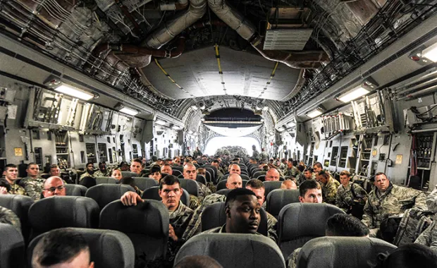 group of soldiers on military plane