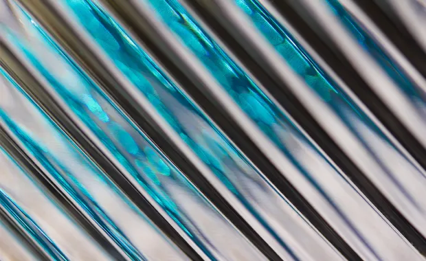 Manufacturing ecosystem with blue metallic data stream