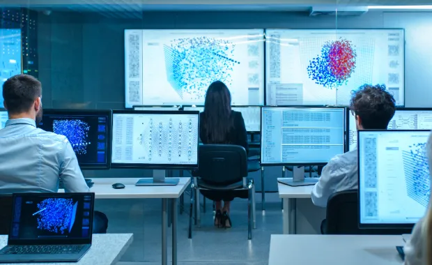 Team of Computer Engineers Work on Machine Learning Neural Network Technology Development.