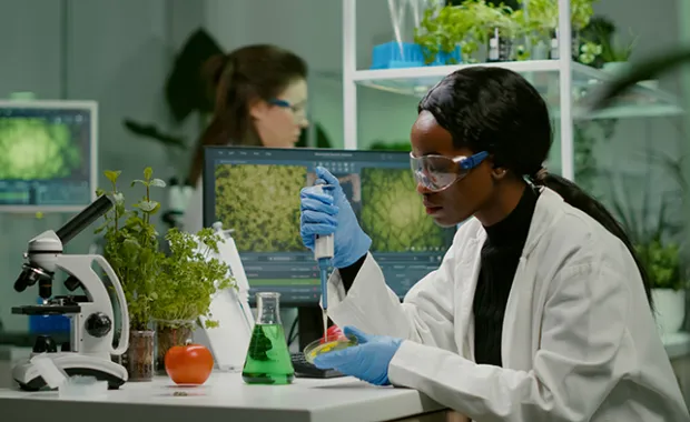 Biologist scientist woman researcher working in biological laboratory