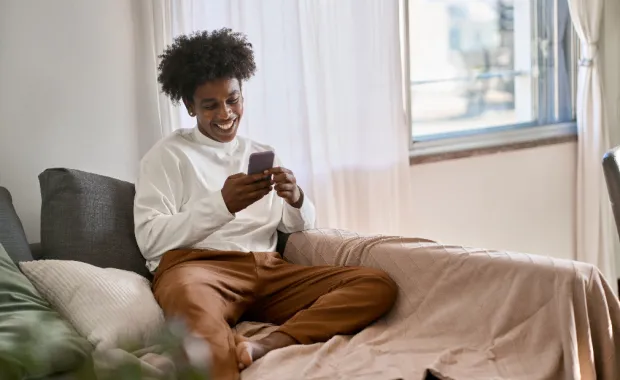 Happy person using taxi app