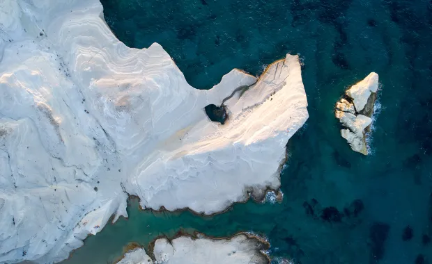 aerial view of icebergs in the sea