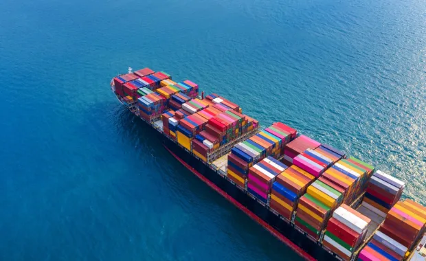 Aerial view of cargo ship at sea