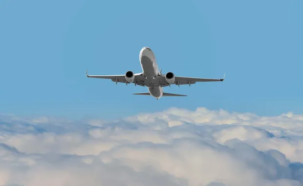 Airplane flying in the clouds