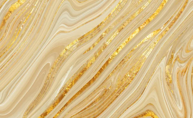 Abstract cream and gold swirls form a flowing, marbled pattern.