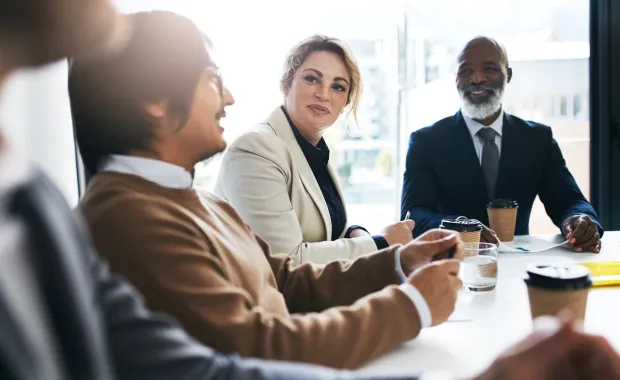 CGI consultants sat in meeting room
