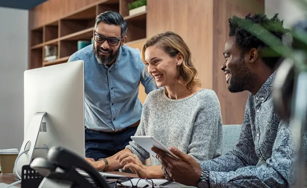 Colleagues discussing OpenAI