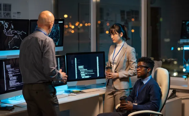 Colleagues working at night