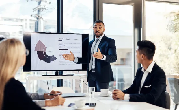 Consultant presenting service management analytics dashboard