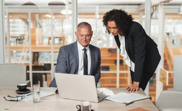 Consultants discussing CGI Invistion