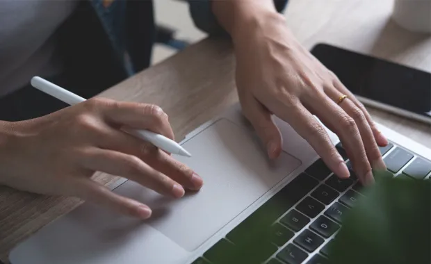 creative professional working on laptop