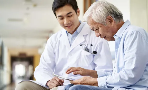 doctor and patient review data on tablet