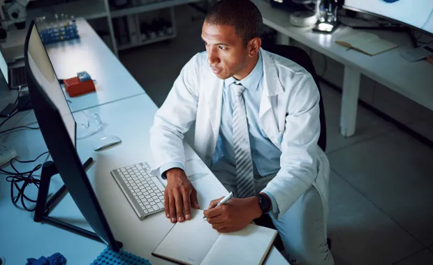 Doctor on a computer