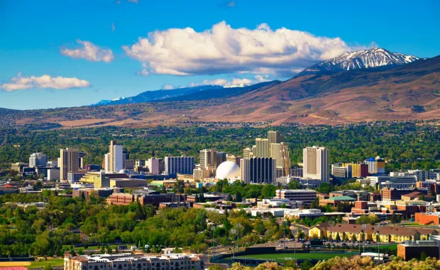 Downtown Reno, Nevada with hotels, casinos and surrounding mountains