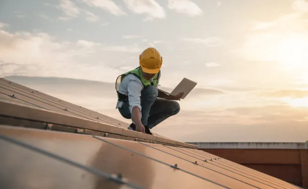 Engineer checking solar panel