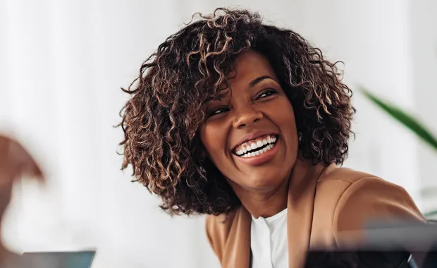 Female business woman laughing