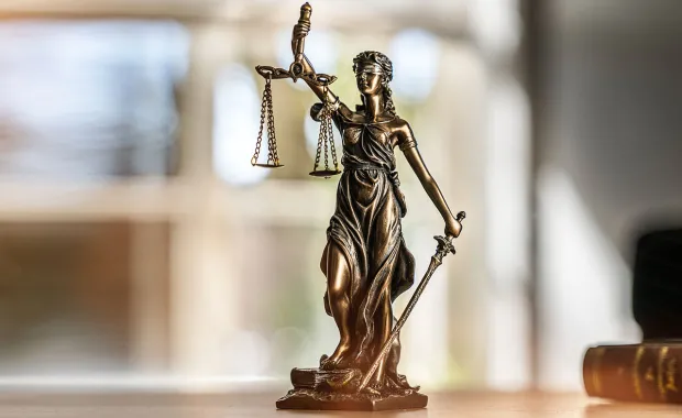Small figure of Lady Justice 