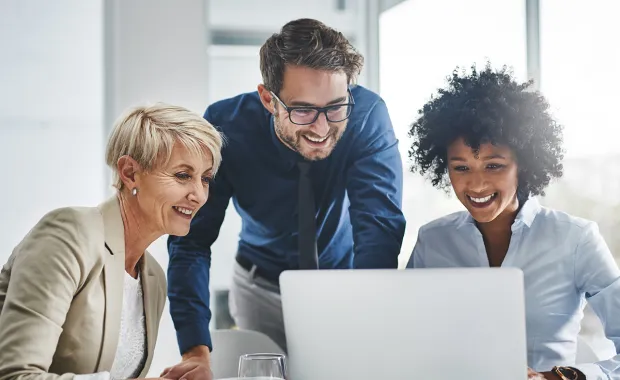 Professionals on discussion with laptop