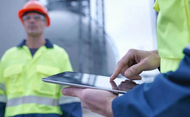 Worker using a tablet device
