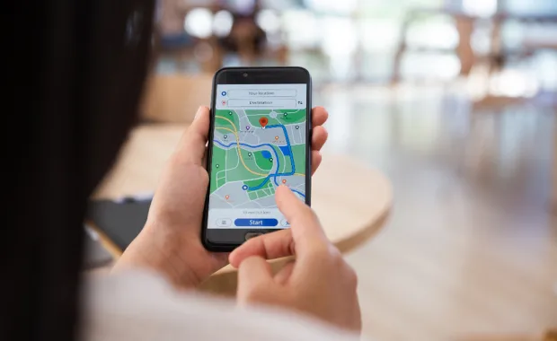 woman using maps on her phone