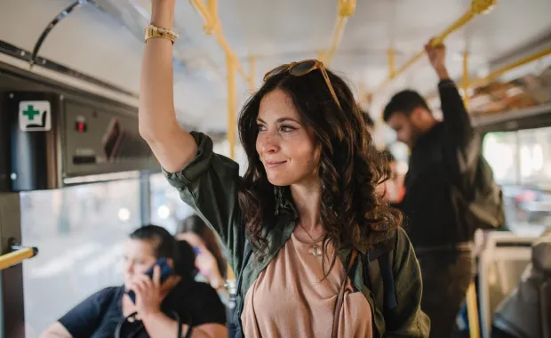 Woman in bus Adobe_515068974