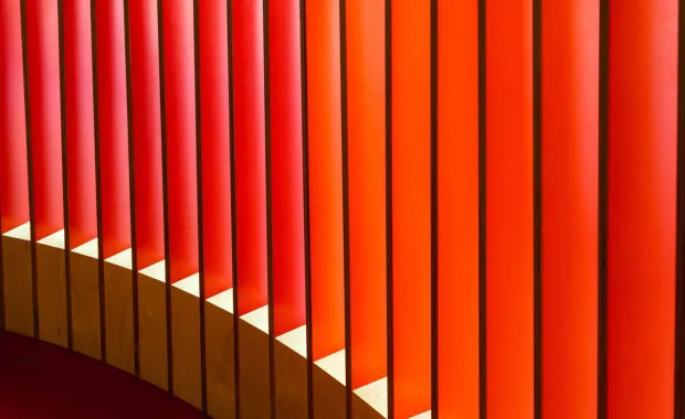 Orange abstract lines on a building