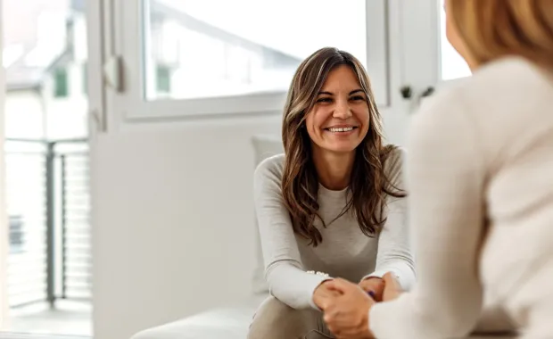 Woman in a conversation with a health care provider