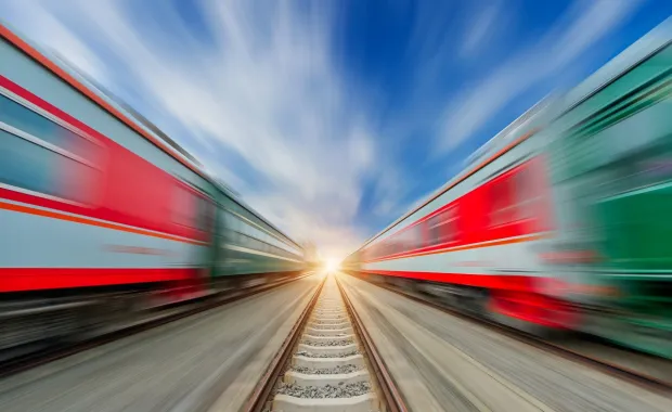 Fast moving trains on tracks