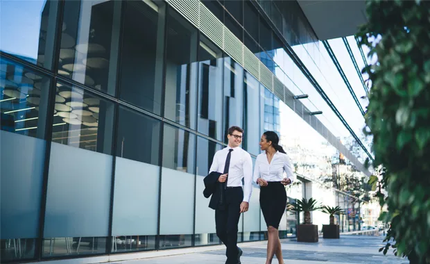 two colleagues walking