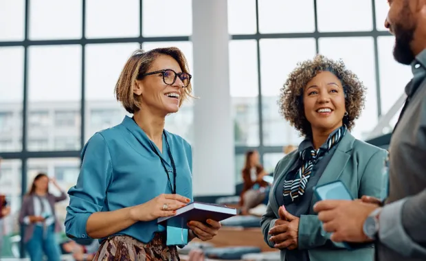Two consultants at a conference