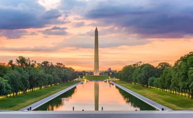 The Washington Monument and reflecting pool at dusk