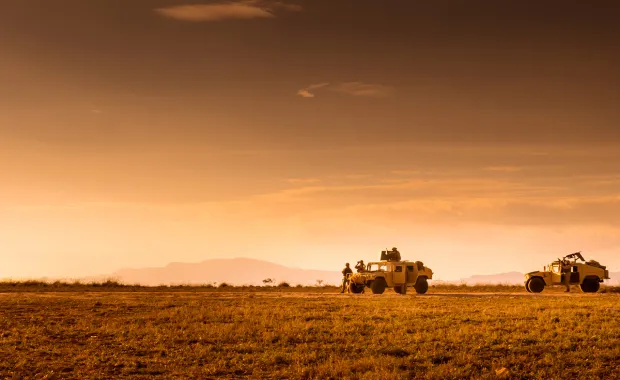 us marine vehicles with sunset in background