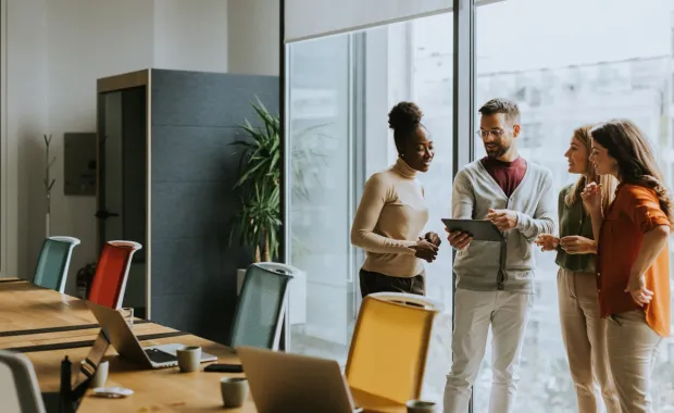 Young multi-ethnic team working in office