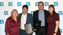 CGI members accepting Guidewire awards at ceremony