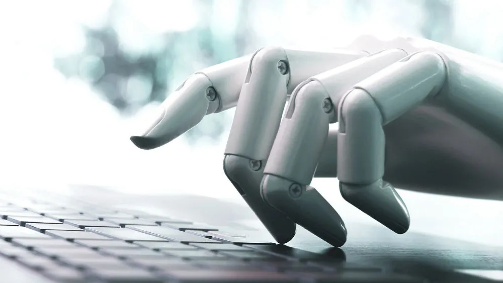 AI robot hand skriver på ett tangentbord