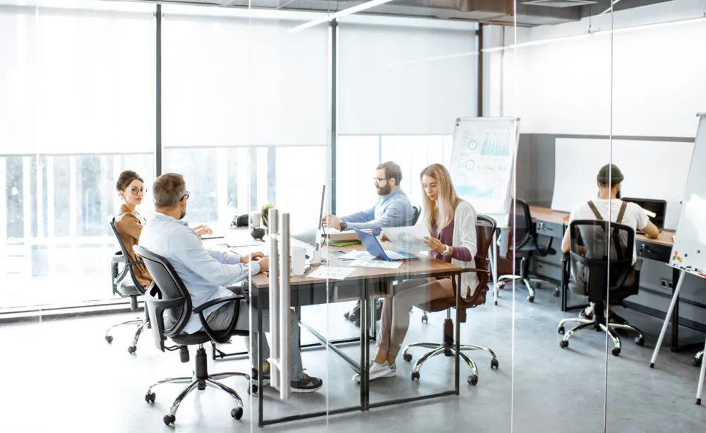 office-workers-glass-conference-room-301701829 Office workers in glass conference room