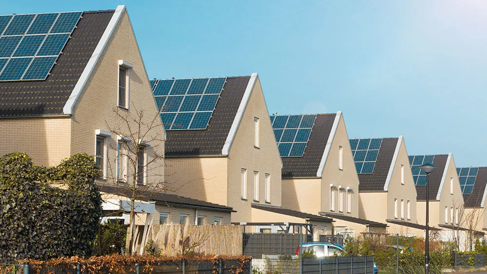 rooftop solar panels on row of houses