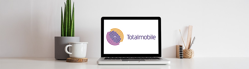 Totalmobile logo on laptop screen Totalmobile logo on laptop screen