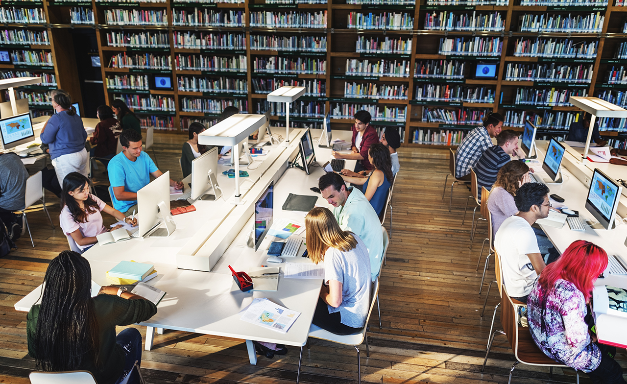 students working in a library