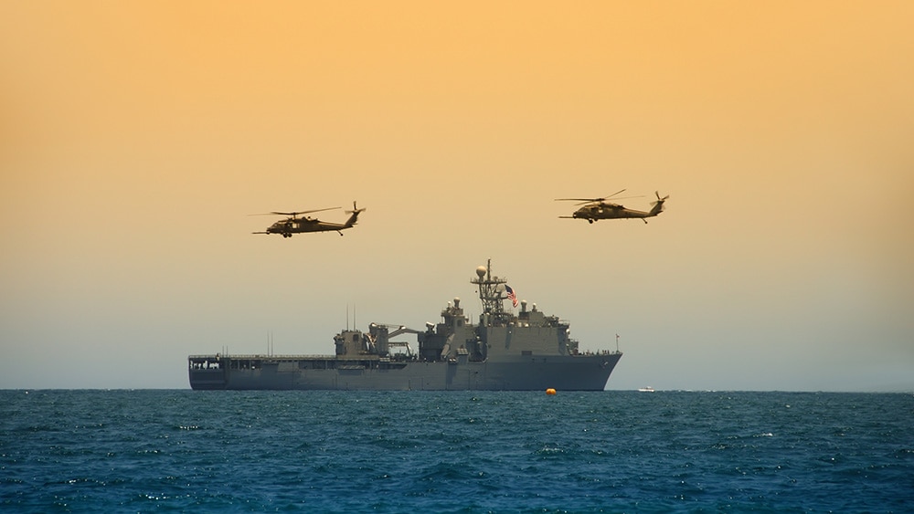 U.S. Navy ship with sunset