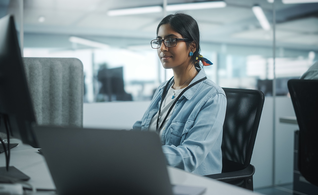 women working on desktop