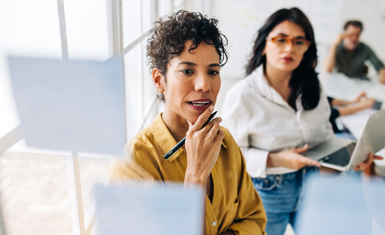 Business consultants brainstorming Business consultants brainstorming