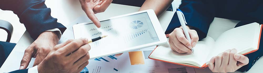 Consultants discussing financial statements Consultants discussing financial statements