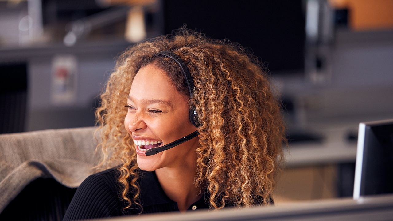woman using phone headset