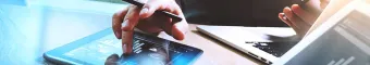 professional reviews data analytics on tablet
