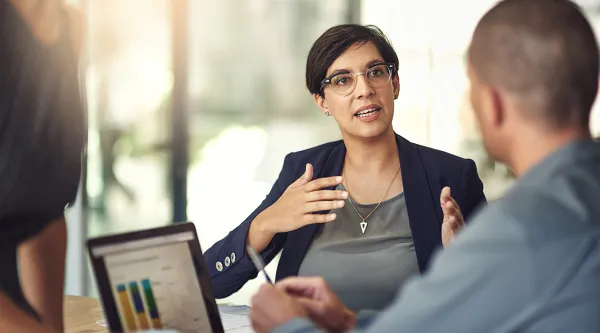 business consultant discussing digital leader insights with client