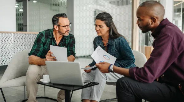 group of people looking at data